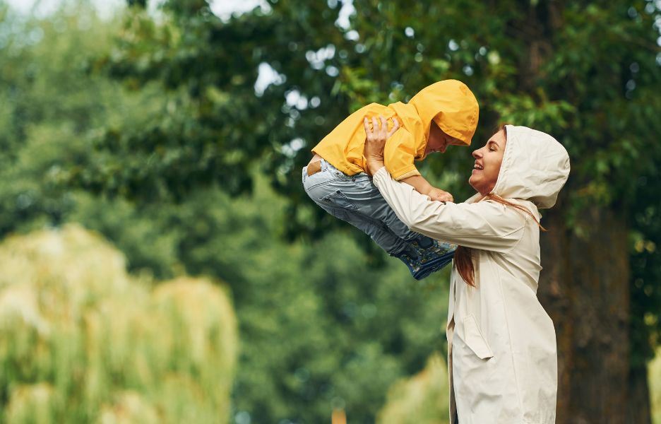 Parent Lifting a Child happy